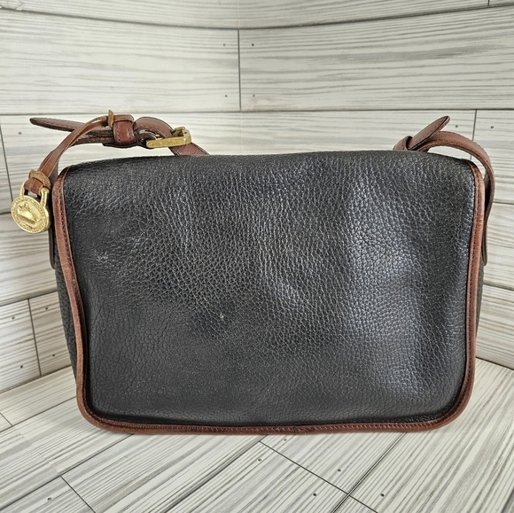 Dooney & Bourke Vintage All Weather Leather Toggle Satchel Saddle Bag in Black - Picture 8 of 17